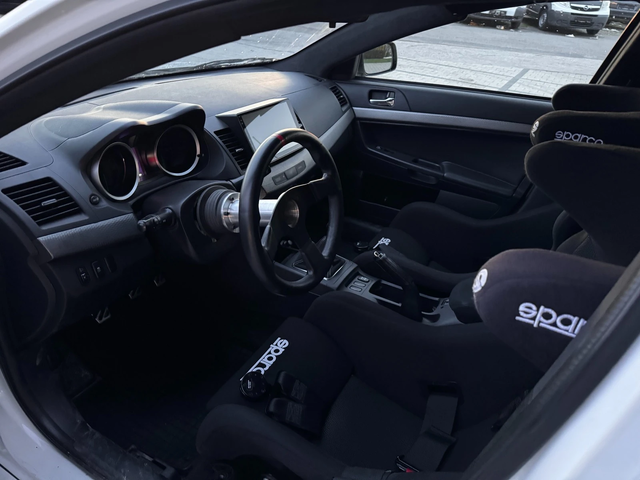 Mitsubishi Lancer Evolution X - автомобили, коли, обяви за нови и употребявани 12