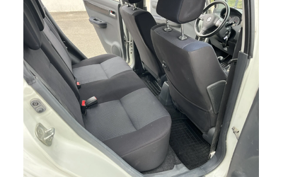 Suzuki Swift 1.3I 90кс 4Х4 EURO 4 KЛИМАТИК - автомобили, коли, обяви за нови и употребявани 9